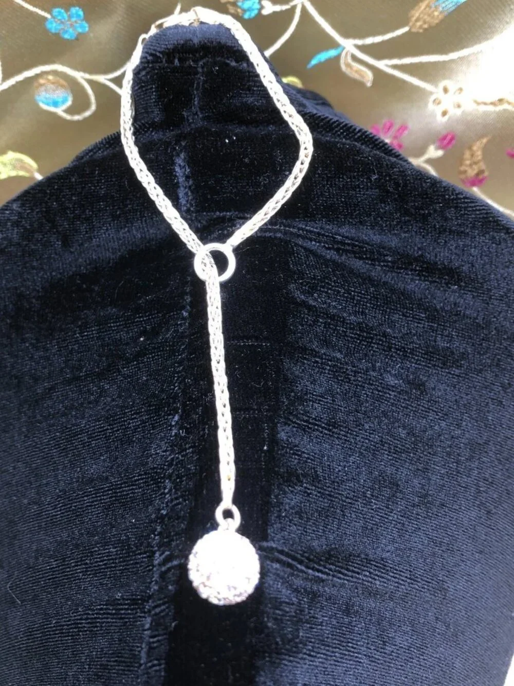8 inch sterling silver lariat slide bracelet with rhinestone glitter ball. 8+ gr